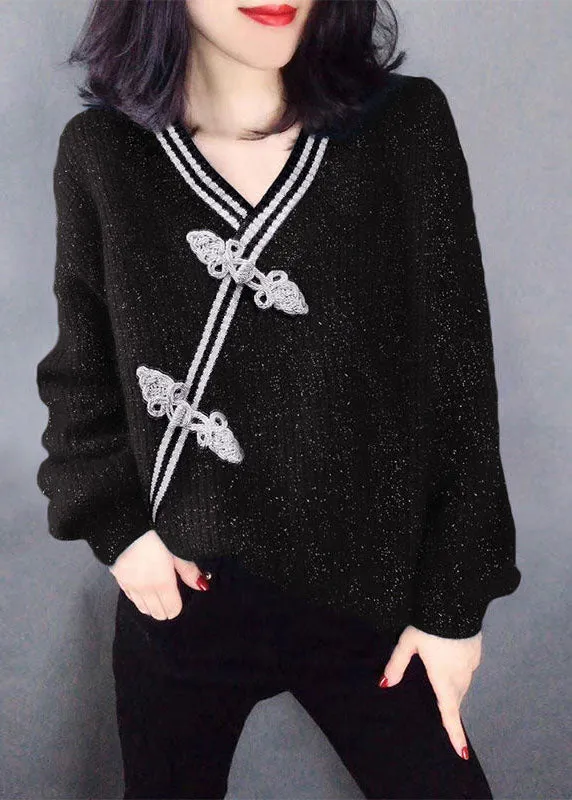 Heidi-Mode - Einfacher schwarzer Strickpullover mit V-Ausschnitt